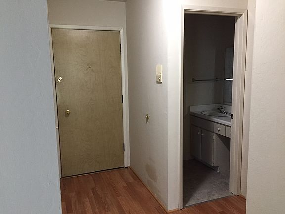 Door to unit and bathroom