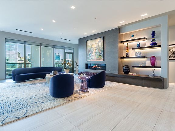 Gas Fireplace wall with lighted display.