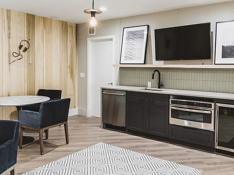 Reimagined clubroom with oven and wine fridge