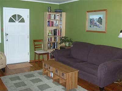 Beautiful oak hardwood floors are found throughout the home. Cozy living room is big enough for gath