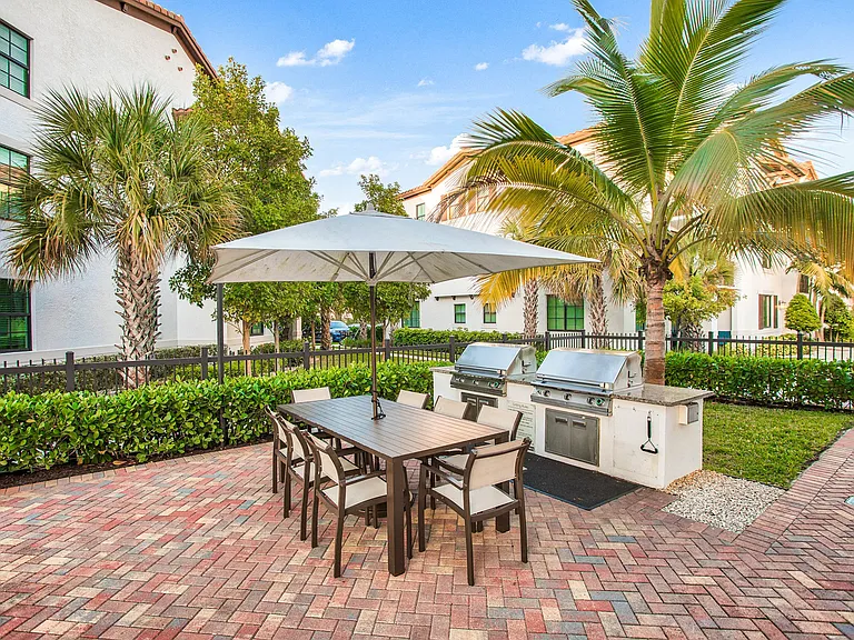 Serve dinner al fresco for friends and family at the grill stations