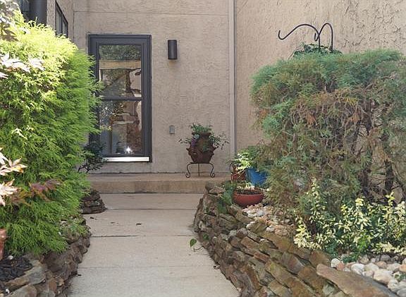 Lush landscaping & retaining wall