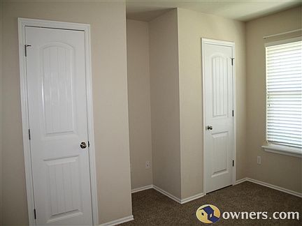 Front spare room with double closets