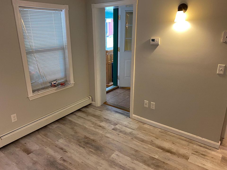 Looking at front door/porch from living room