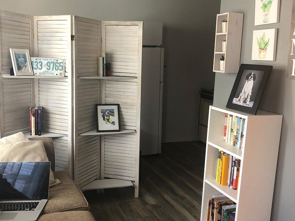 Nice faux wood floor in living area and kitchen. Fresh paint throughout.