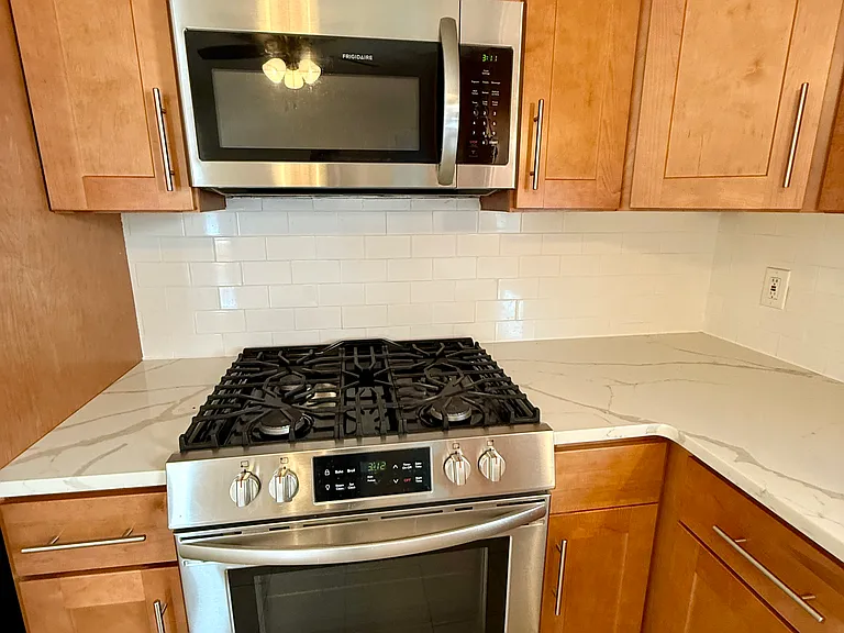 Updated kitchen with stainless steel appliances