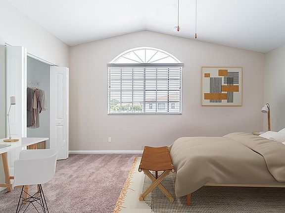 Enjoy a relaxing sleep in this spacious primary bedroom.