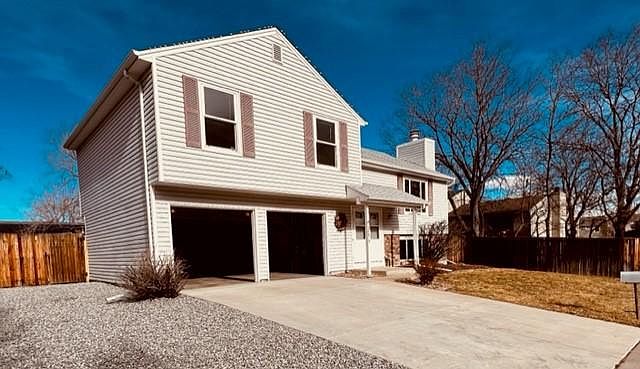 Large front yard and oversized 2 car garage