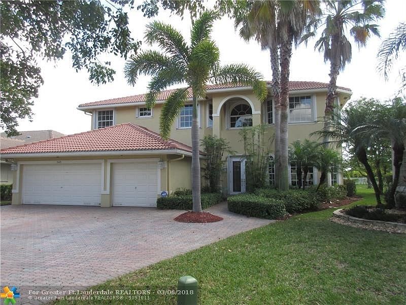FRONT VIEW- BEAUTIFUL LANDSCAPING, 5 BEDROOMS PLUS OFFICE, APPROXIMATELY  OVER 3300 A/C SF-PAVER DRIVEWAY