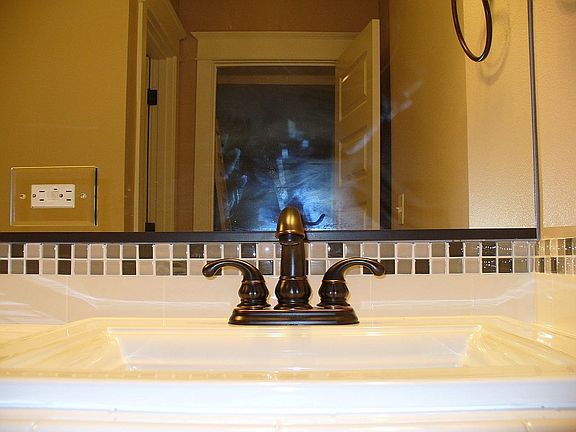 Close Up of Mater Bath Fixtures and Tile