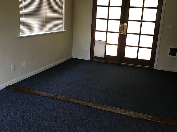 Living/dining room w/French Doors to back yard