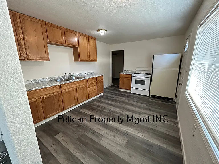 Kitchen from living room, and laundry room doorway