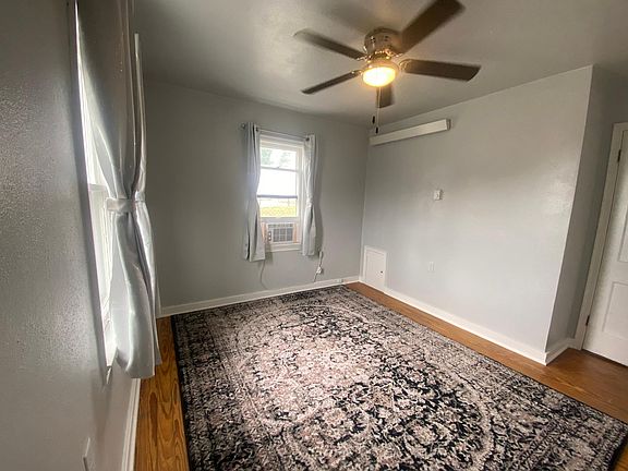Single bedroom with large closet with tons of room for storage. Air conditioning unit and radiant heat.