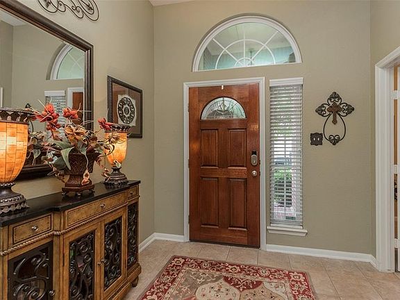 This immaculate home has high ceilings in the living areas. Neutral tile floors grace the entry, hall, kitchen andbreakfast room.