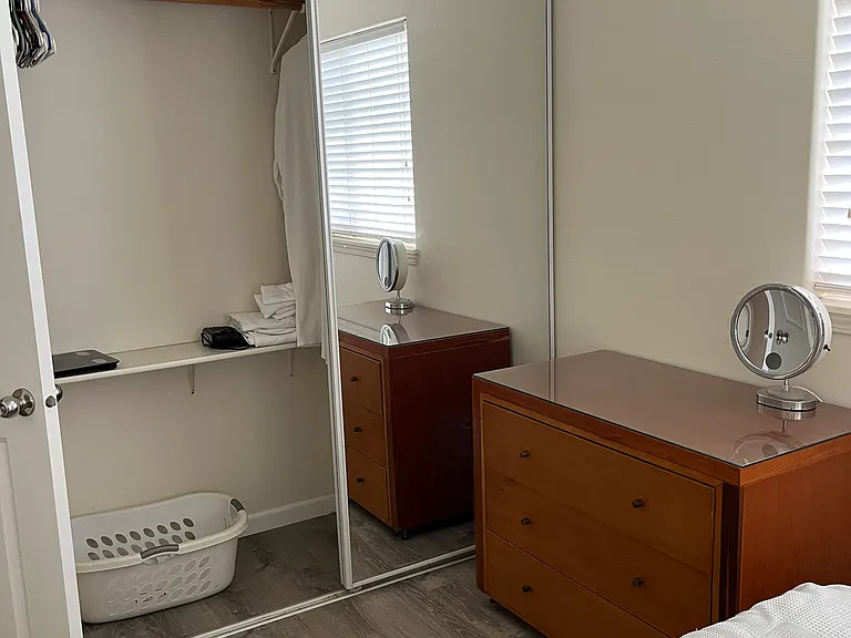 3rd bedroom closet with dresser