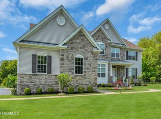 61 Highland Ridge Rd, Manalapan, NJ 07726