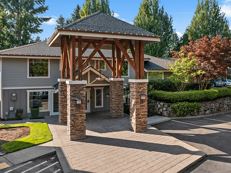 Welcoming community entrance with modern architecture