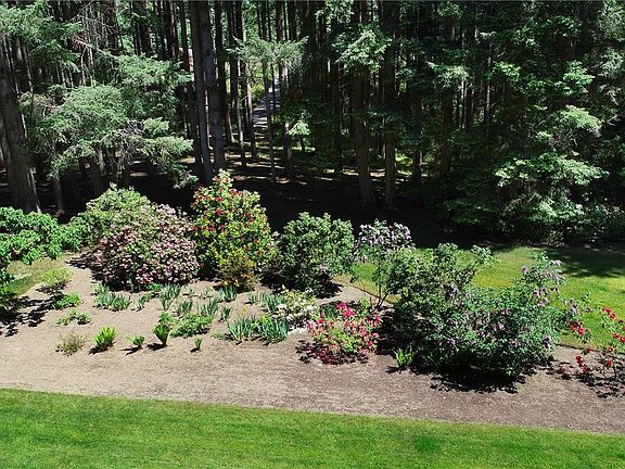 Mature landscaping with room for your personal touch.