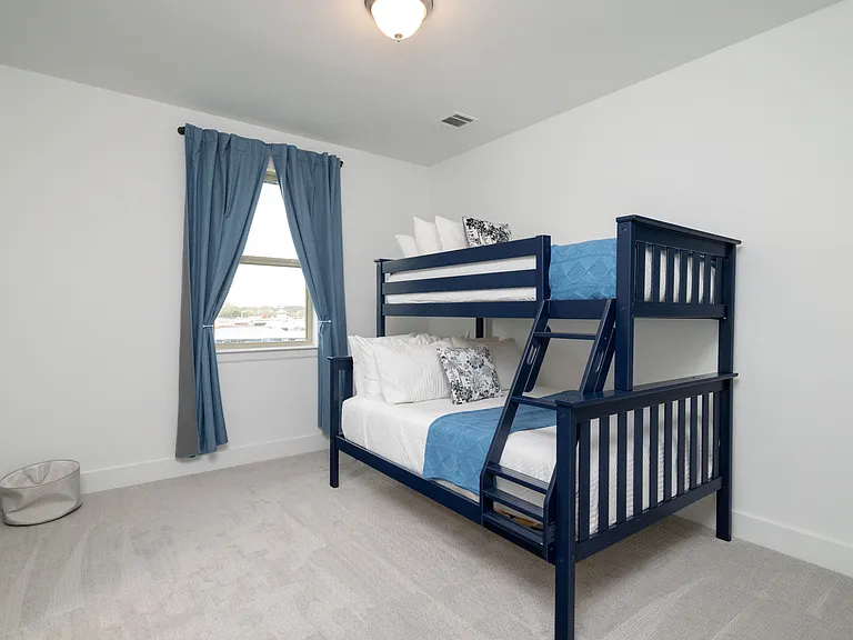 Bedroom #3 has a bunk bed w/ the bottom as a full size bed & top is a twin bed