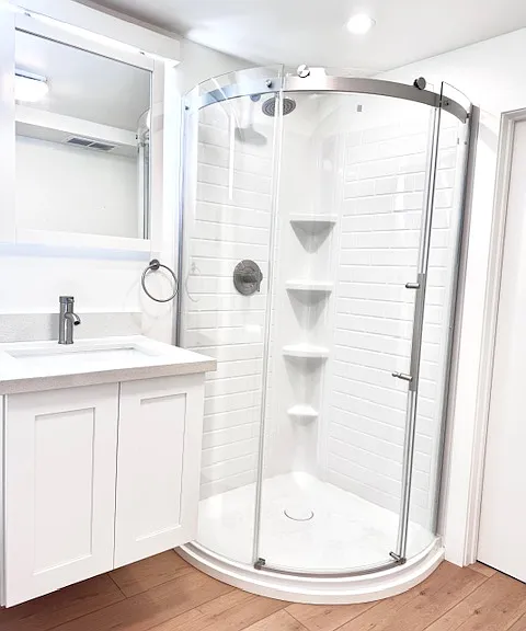 Brand new full bath with wall art.