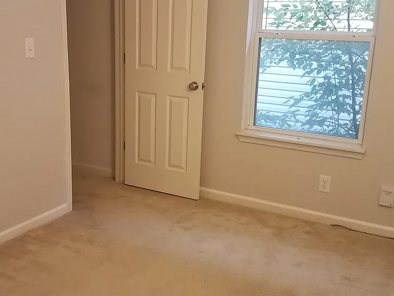Bedroom with walk-in closet