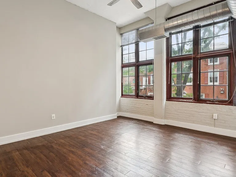 Spacious Living Space With Huge Windows and Natural Light
