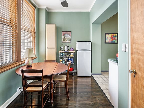 SEPARATE DINING AREA WITH TWO LARGE WINDOWS FOR NATURAL LIGHT