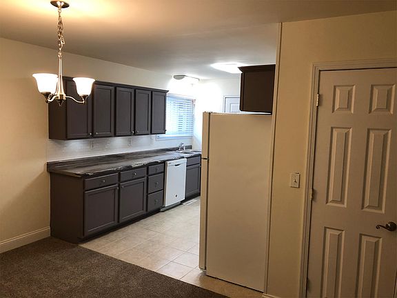 Open floor plan to galley kitchen