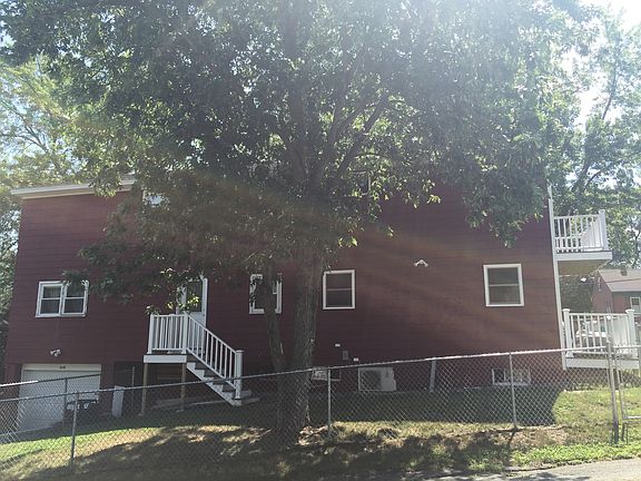 Back of house with garage