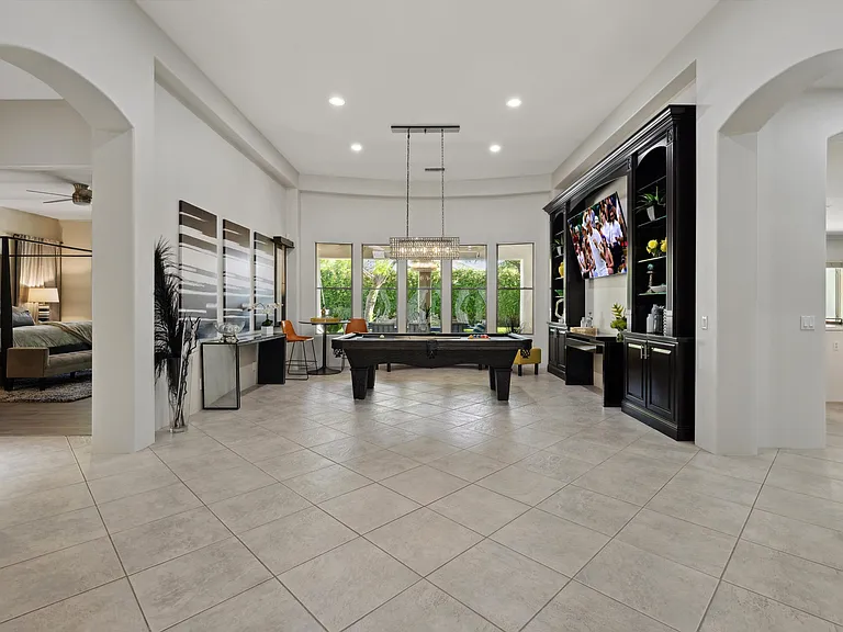 Open game room with tv to watch the game