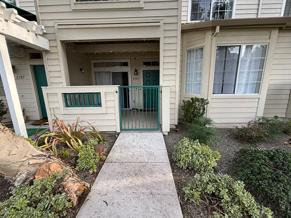 Unit entrance with new sidewalk