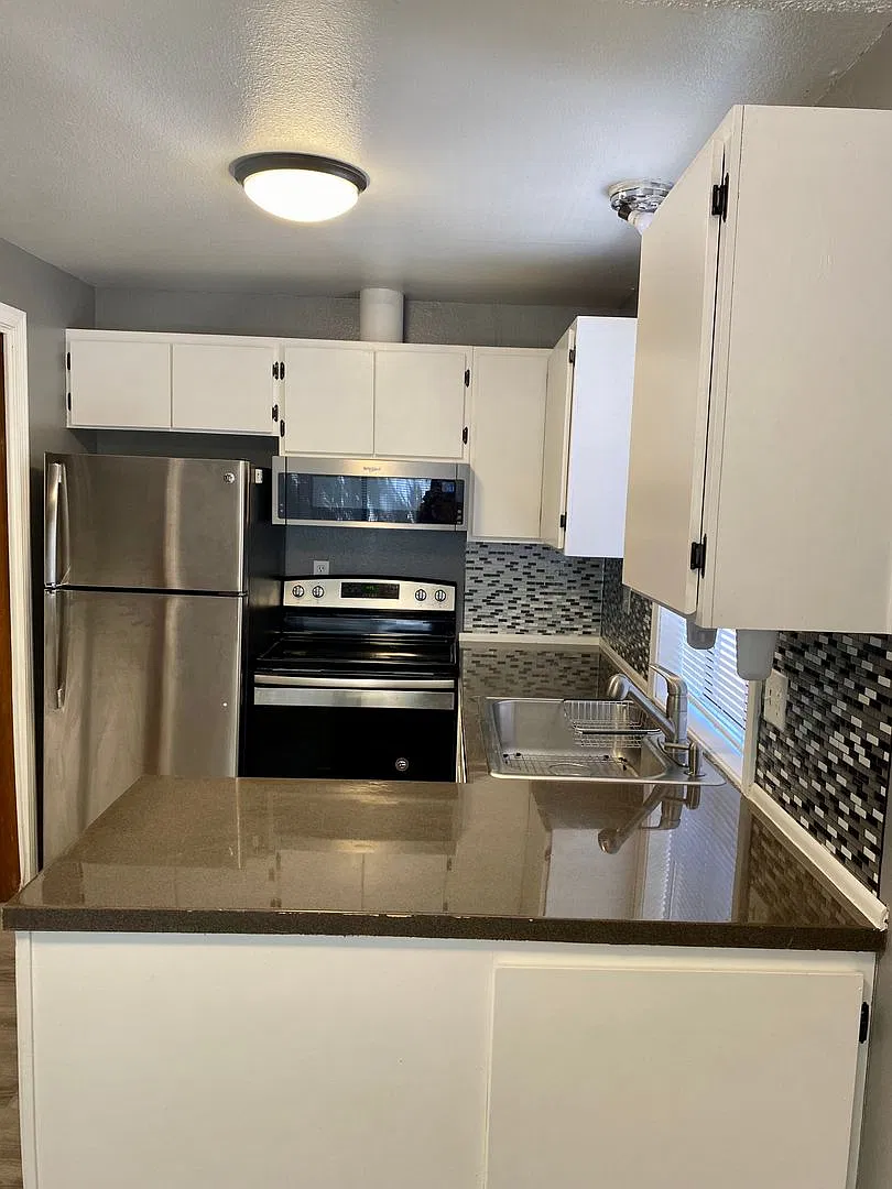 2 Bed 1 Bath Duplex w/ Fenced Yard and Off Street Parking — Photo 1