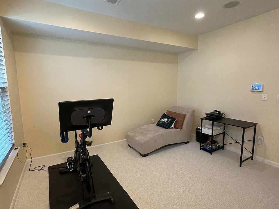 Entry level which includes half bath, closet and rear entry to garage