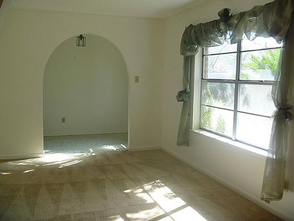 Lovely arches. This home offers lots of natural light.