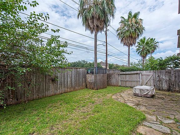 Nice sized fully fenced back yard with patio and lawn