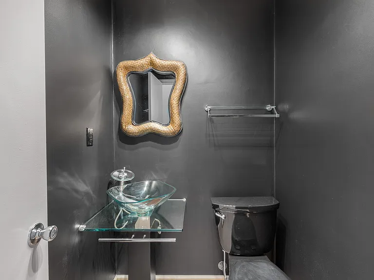 Downstairs Guest Bathroom with Terracotta Concrete-Stained Floors and Chalkboard Paint Walls