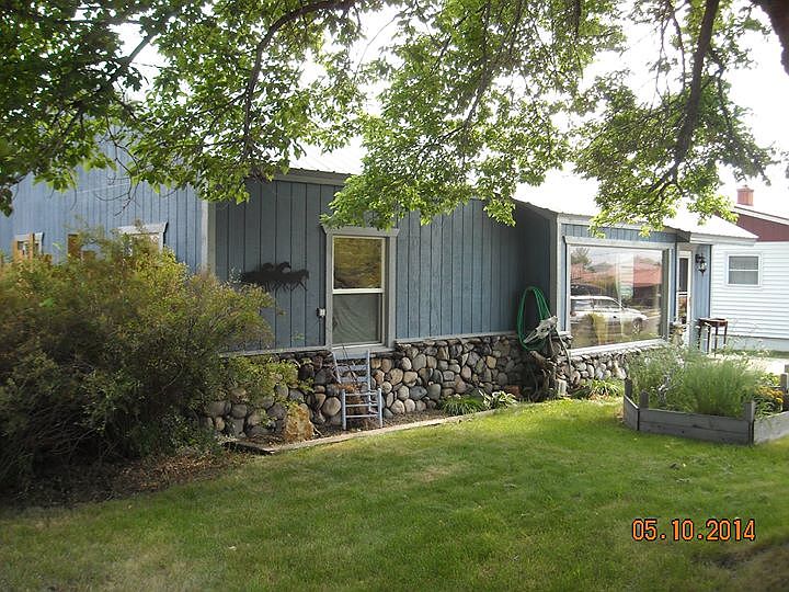 Front w/natural river rock.