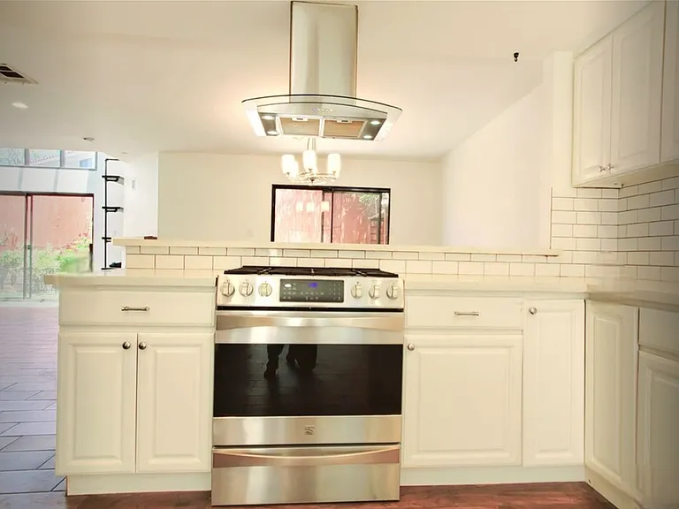 Kitchen range and hood