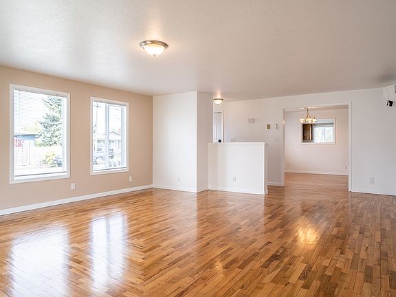Living room with view into dinning room