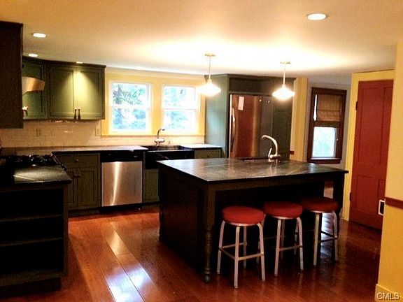 Kitchen with custom cabinets and soapstone counters
