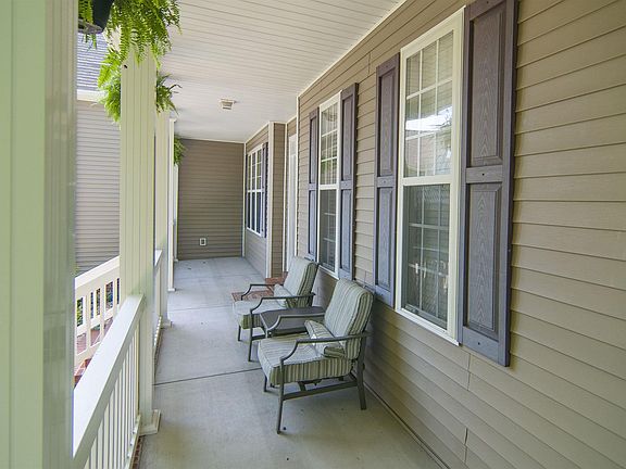 Image 3: Beautiful wraparound front porch