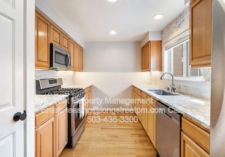 10247 NW Village Heights Dr — Photo 17