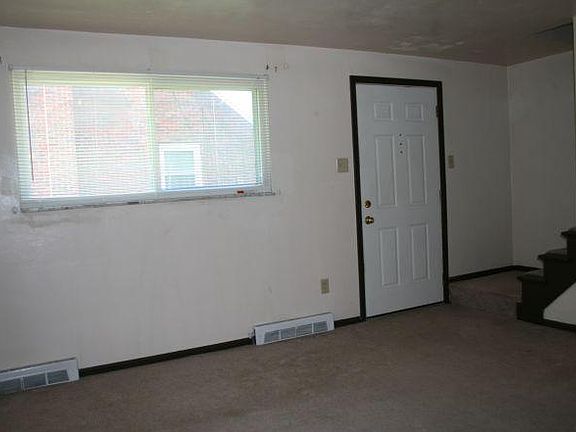 Living room with wall to wall plush carpet