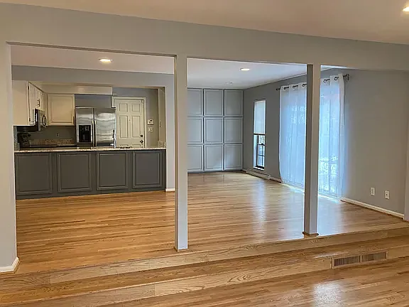 Open dining area seamlessly connected to the updated kitchen, ideal for gatherings and everyday living.