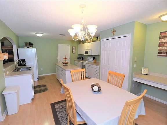 View of Kitchen - plenty of cabinets and drawers complete with brushed nickel handles. Stainless double bowl sink with brushed n
