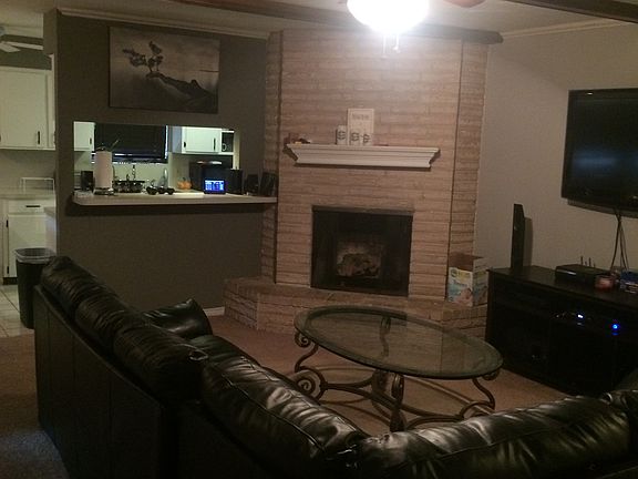 Open Living Room w/Fire Plac