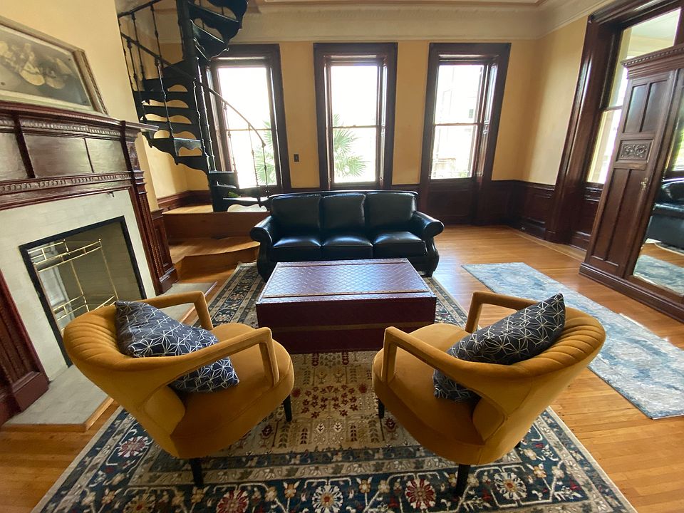 Living Room with pullout sofa and kitchen