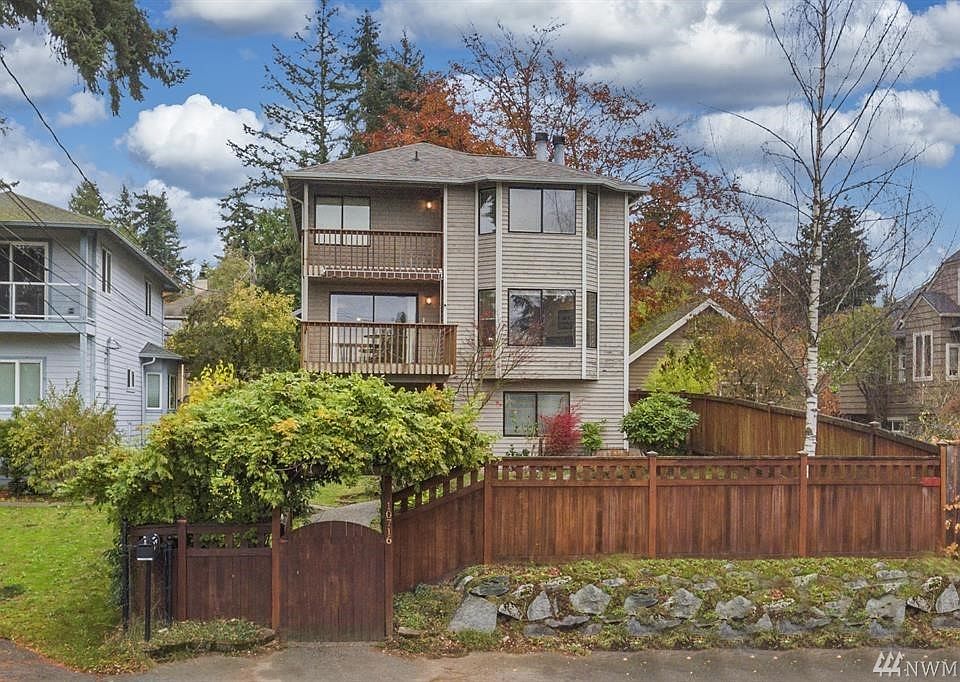 Privacy and usable space behind the beautiful cedar fence.  That upper deck offers a lovely view of Puget Sound. The middle level deck offers a partial Sound view too. 