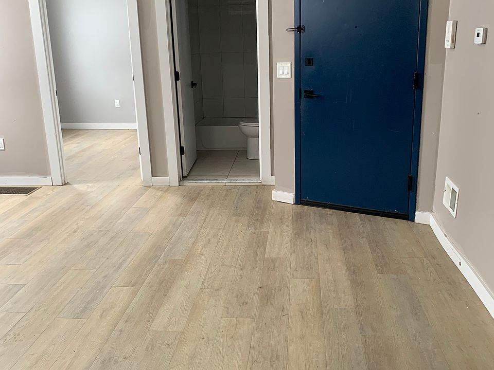 entrance to apartment and living room