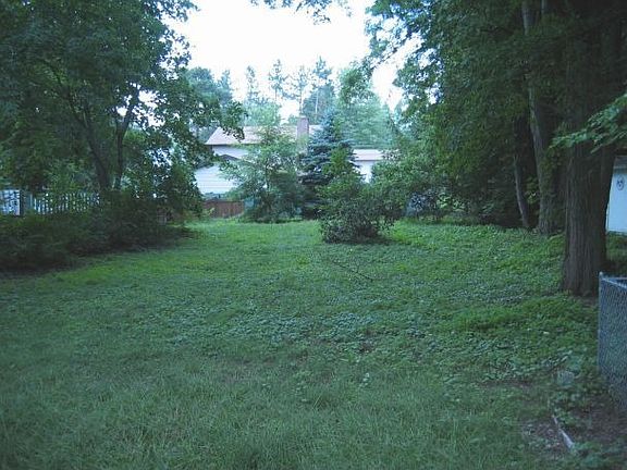 A deep back yard - plenty of room to build a deck or patio!